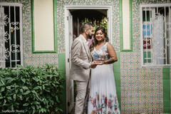 Couple by Mosaic Wall