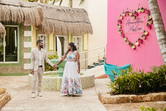 Couple by Heart-Shaped Floral Decor Couple by Heart-Shaped Floral Decor