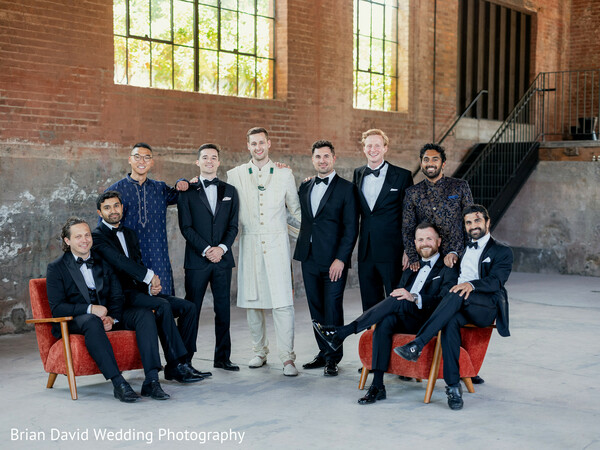 groomsmen portrait,men’s wedding fashion,rustic venue,indian-western fusion wedding,confident pose,wedding crew