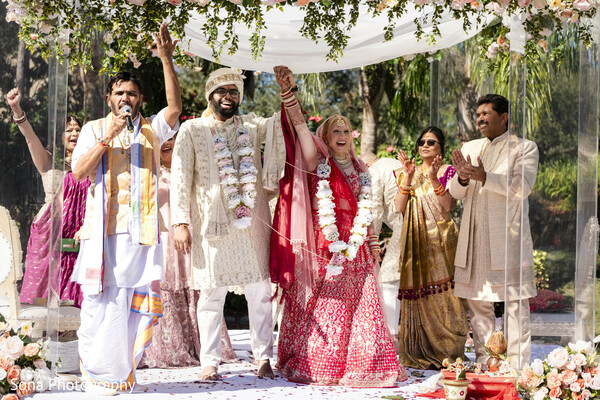 family photo,indian wedding,ethnic outfits,group portrait,joyful moment,tradition