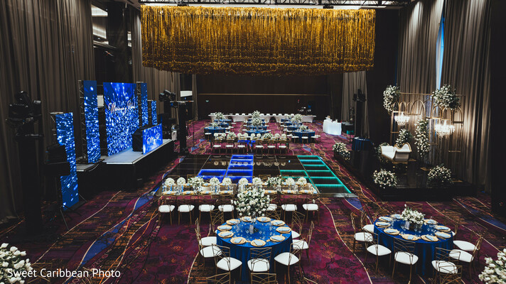 reception portraits,bride and groom seating,formal wedding reception,modern decor,luxury ballroom,sweetheart table,couple’s glam moment,reception design,love in lights,elegant eveningwear