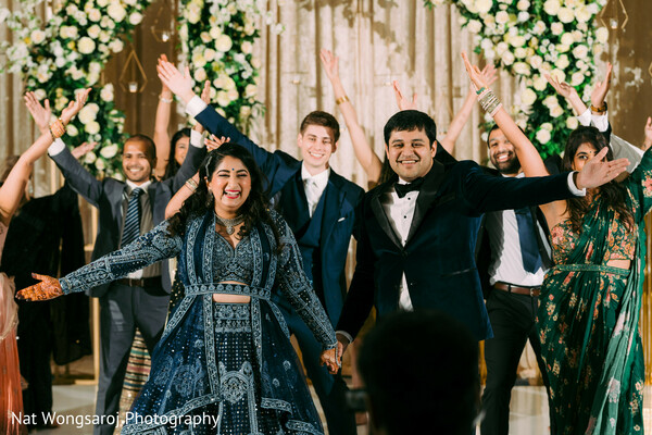 indian wedding dance,reception fun,couple dancing,choreographed wedding dance,south asian celebration,wedding entertainment,bride and groom performance,dance floor magic,glamorous wedding party,reception joy