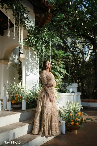 bridal portrait,elegant bride,shimmering gown,outdoor bridal photo,romantic bride moment,wedding fashion,poised bride,bridal style inspiration,south asian bride,garden bridal portrait