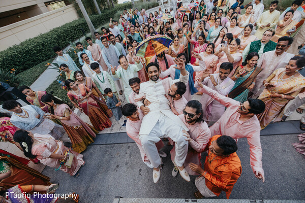 engagement couple portrait,luxury indian outfits,emerald bridal necklace,black sherwani,bridal blouse design,pre-wedding photo inspiration,mauve lehenga look,south asian wedding fashion,tropical garden wedding,statement jewelry bride