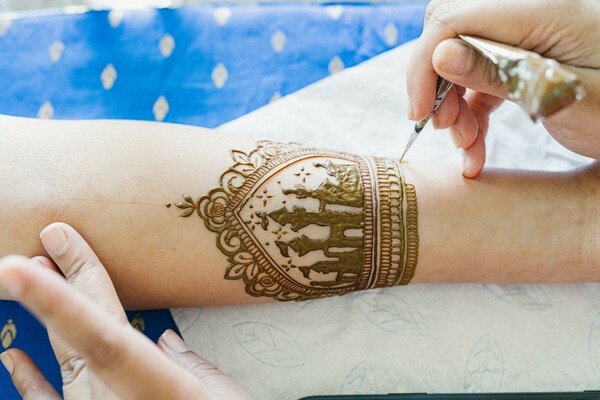 bridal mehndi,henna art,crown design,bridal details,traditional ceremony,elegant hands,indian wedding,intricate design,bride prep,cultural beauty