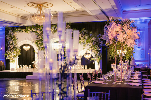 reception decor,south asian reception,luxury wedding decor,floral arches,candlelit wedding,ballroom decor inspiration,elegant wedding details,romantic reception setup,lavish wedding design,indian wedding inspiration