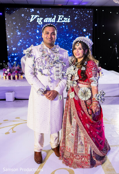 money pinning tradition,south asian wedding attire,cultural wedding rituals,festive traditions,wedding traditions,symbolic wedding moments