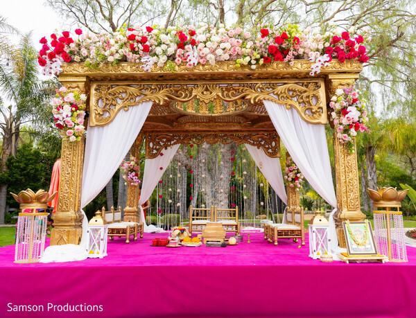 mandap decor,luxury indian wedding decor,floral mandap,south asian ceremony inspiration,pink aisle,traditional indian wedding,wedding stage design