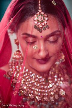 Beneath the Veil, She Glows