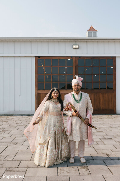 south asian couple portrait,indian wedding couple,bride and groom style,wedding arrival moment,traditional indian attire,pre-ceremony portraits
