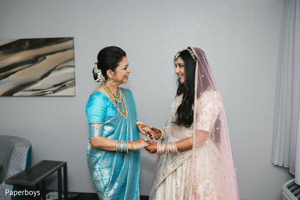 mother of the bride,indian wedding traditions,family wedding moments,bridal blessings,south asian family wedding,emotional wedding moments