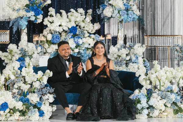 south asian wedding,indian wedding stage decor,reception seating,luxury mandap design,floral wedding backdrop,indian wedding reception,elegant wedding decor,modern south asian wedding,bride and groom portraits,wedding stage inspiration