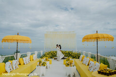 A Golden Haldi Set Against Bali Blues