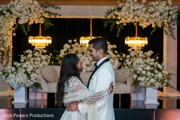 romantic bride groom portrait,forehead touch couple,indian wedding jewelry,bridal mehndi details,emotional wedding moment,south asian couple portrait,garlanded bride groom,intimate wedding photography,traditional wedding attire,love-filled moment