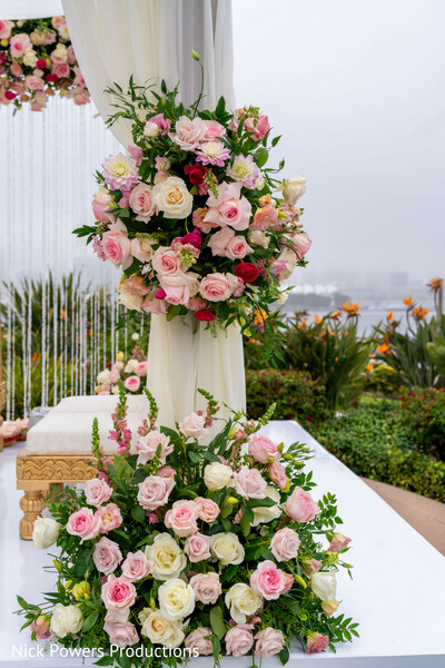mandap florals,wedding decor details,blush wedding flowers,floral installation,ceremony styling,luxury wedding decor,pastel floral design,indian wedding aesthetics,destination mandap,romantic wedding setup