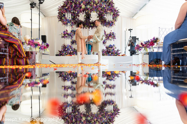 mirrored aisle wedding,floral mandap decor,luxury indian wedding ceremony,dramatic wedding design,ceremonial vows,purple wedding florals,modern mandap,statement wedding decor,elevated ceremony styling,south asian wedding