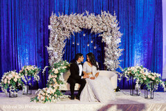 Elegance and Romance: A Newlywed Moment Amidst Floral Beauty