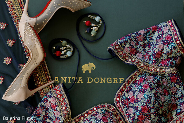 bridal lehenga,luxury bridal flatlay,embroidered lehenga detail,indian designer wedding fashion,bridal heels detail,statement bridal earrings,couture south asian wedding,wedding fashion styling,luxury bridal accessories,ornate lehenga embroidery