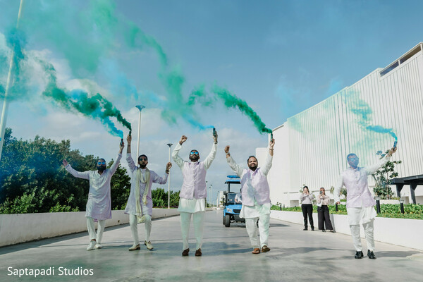 groom squad entrance,smoke flare wedding photo,groom friends celebration,modern baraat moment,pastel kurta outfits,energetic wedding entrance,destination indian wedding,groom party photography,wedding celebration energy,south asian wedding fun