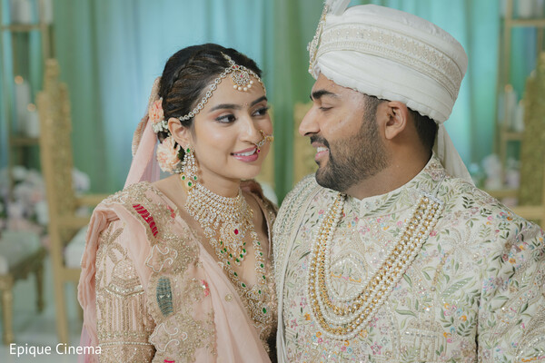 couple portrait close up,bride and groom love,indian wedding attire,jewelry details bride,sherwani groom,romantic wedding portrait,south asian couple,emotional connection,wedding photography portrait,elegant couple
