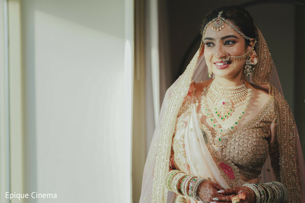 bridal portrait window light,indian bride jewelry,bridal makeup glow,wedding day portrait,south asian bride,traditional bridal look,natural light photography,elegant bride styling,bridal fashion inspiration,close up bride