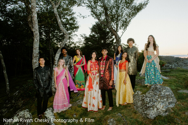 wedding party group portrait,indian wedding guests,colorful outfits group,outdoor wedding photography,bridal party pose,south asian wedding style,group portrait fashion,destination wedding group,friends and family wedding,vibrant attire