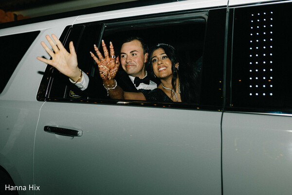 evening wedding attire,emerald bridal gown,groom black tuxedo,editorial wedding portrait,luxury couple fashion,indian fusion wedding style,formal wedding look,bride statement dress,elegant couple pose,modern wedding fashion