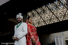 A Maharani in Crimson Beside Her Raja