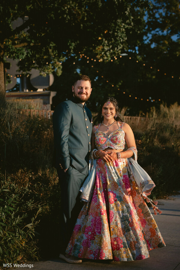couple portraits,floral lehenga,teal sherwani,garden wedding,golden hour portraits,romantic moments,outdoor reception,south asian fashion,luxury wedding,evening portraits