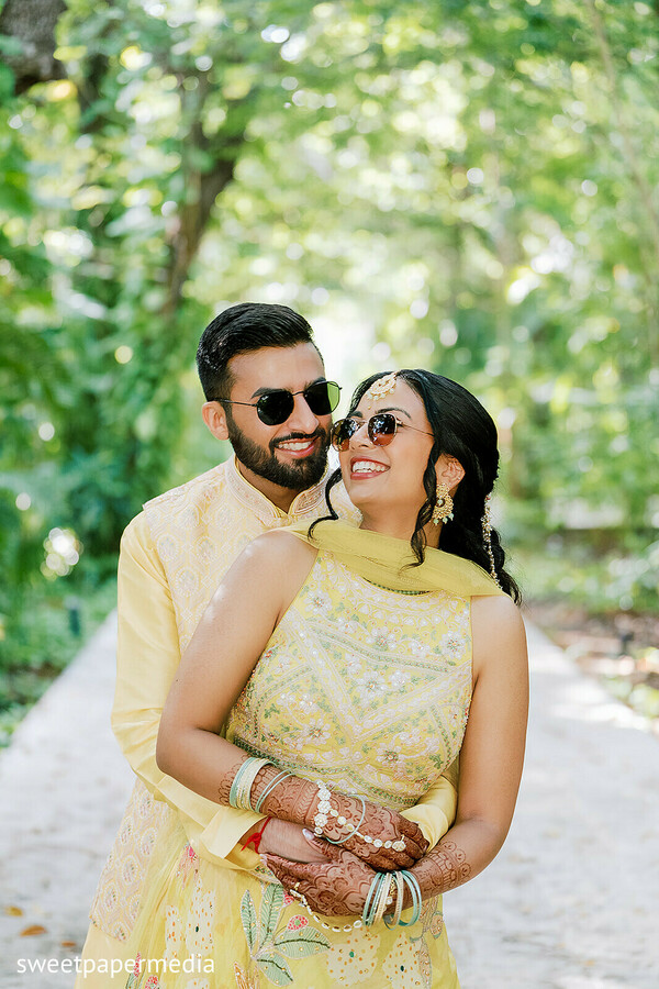 couple portraits,yellow outfits,tropical garden,candid romance,pre wedding shoot,destination wedding,matching attire,outdoor portraits,joyful moments,south asian couple