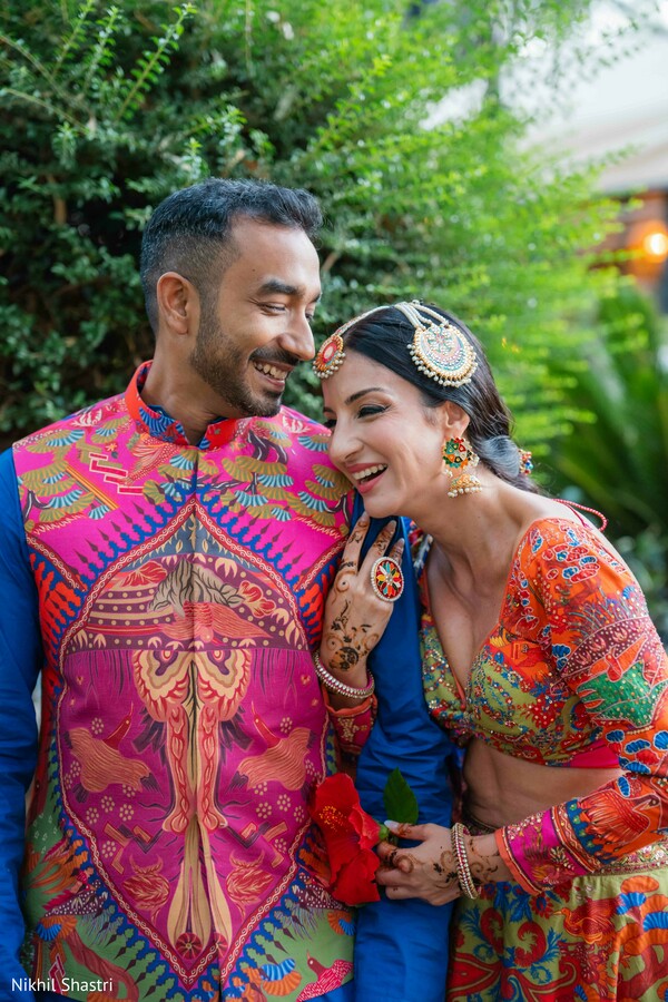 haldi outfit,colorful fashion,couple portraits,pre wedding events,vibrant lehenga,wedding style,candid moments,south asian wedding,festive attire,cultural celebration
