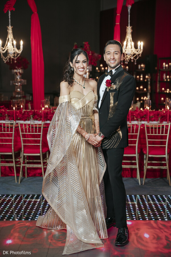 reception portraits,bride and groom,reception attire,luxury wedding,black tie,evening reception,elegant couple,wedding fashion,floral decor,glamorous wedding
