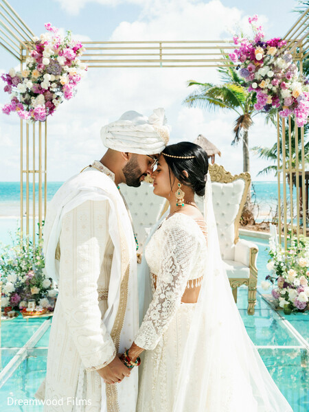 bride and groom,couple portraits,romantic moments,floral mandap,destination wedding,beach wedding,ocean views,ceremony portraits,indian wedding,luxury wedding