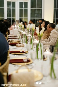Elegant Reception Dinner Table Setting with White Floral Centerpieces