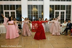 Dance Performance with Red and Light Pink Outfits