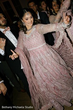 Woman Dancing in Pink Dress