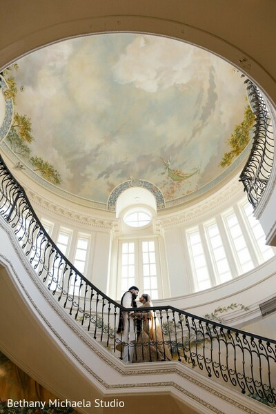 wedding,couple,grand staircase,painted ceiling,architectural details,romantic