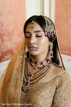 Bride in Gold Attire with Red and Gold Jewelry