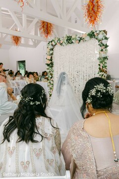 Elegant White Wedding Ceremony with Floral Arch Decor