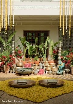 Yellow Rug and Floral Decor with Brass Accents