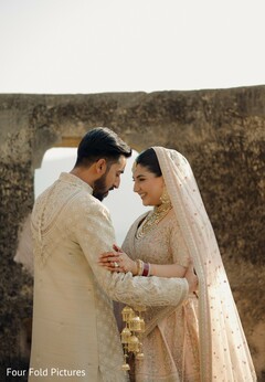 Couple's Elegant Portraits in Cream and Gold Wedding Attire