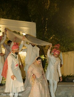 Bride's Entrance with White Dupatta and Groomsmen in Sherwanis