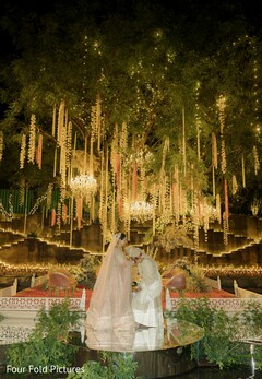 Night Wedding Ceremony with Draped Floral Decor