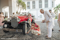 Bride in Red and Gold Lehenga with Vintage Car
