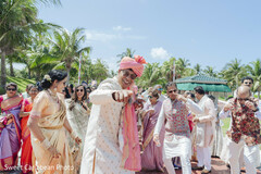 Groom Dancing with Guests in Tropical Outdoor Setting