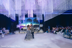 Couple Dancing Under Sparkling Ceiling Decor and Fog Effect