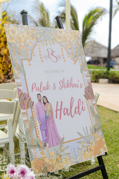 Haldi Ceremony Welcome Sign with Illustrated Couple