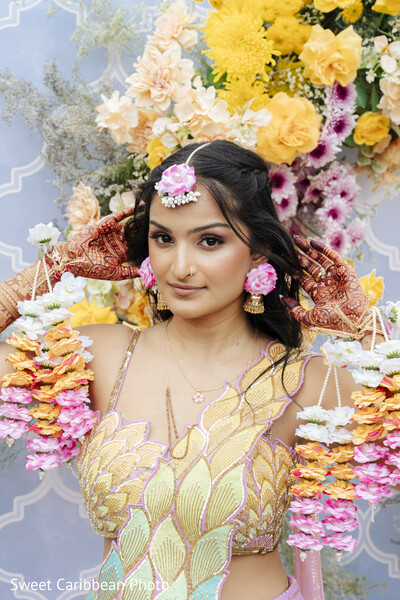 floral jewelry,mehndi,floral decor,pink flowers,yellow flowers,orange flowers,floral garlands,colorful top