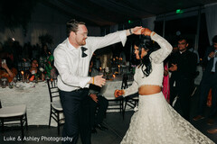 Joyful Couple Dances at Their Elegant South Asian Wedding Reception
