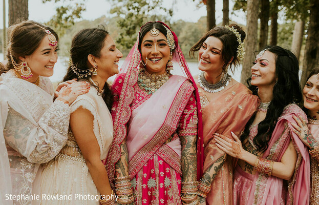 bridal fashion,pink lehenga,bridal jewelry,wedding party,cream outfits,peach sari,traditional attire,outdoor setting,mehndi,bridal veil